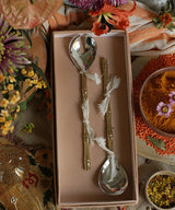 Salad servers in gilded brass